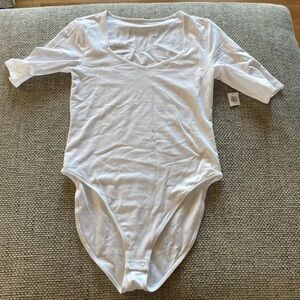 Old Navy White bodysuit with 3/4 sleeves.